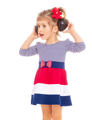 charming little girl in big headphones.