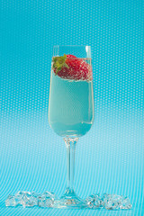 fresh strawberry on a glass with champagne