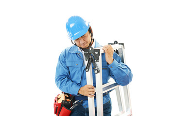 疲れた表情の作業員