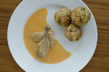 Chicken with dumplings and paprika sauce