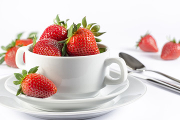 Festive table set with strawberry on white background side view