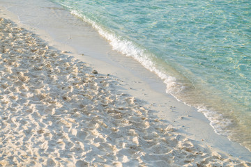 Wave of the sea on the sand beach