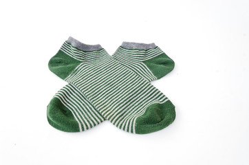 green striped socks isolated on white