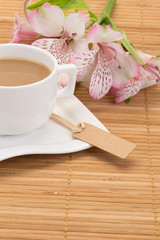 coffee and flowers on table