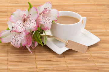 coffee and flowers on table