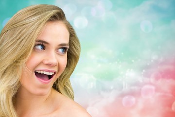 Composite image of smiling blonde natural beauty