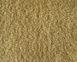 Texture of brown terry cloth fabric