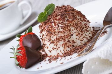 panna cotta with grated dark chocolate and strawberries