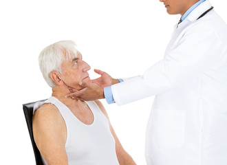 Doctor performing neck lymph node examination on a patient 