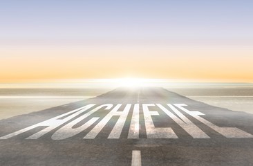 Achieve against road leading out to the horizon