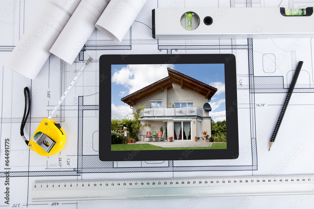 Aufkleber digital tablet with architect's tools over blueprint