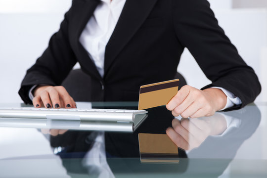 Businesswoman Holding Credit Card