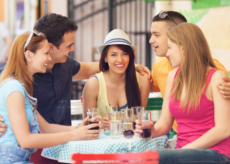 Young friends in a cafe