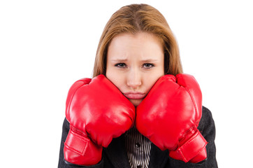 Woman businesswoman with boxing gloves on white