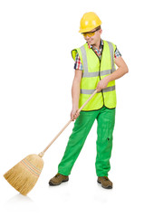 Funny janitor with broom isolated on white