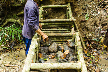 dam To slow down the flow of water.