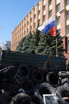 Russian flag over the barricades in Lugansk