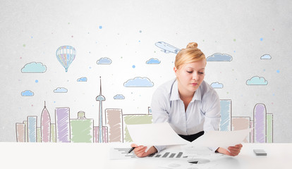 Pretty businesswoman with colorful city sky-scape background