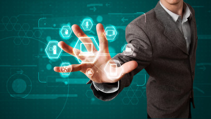 Businessman pressing virtual media type of buttons