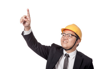 Asian businessman with yellow hardhat point up and smile