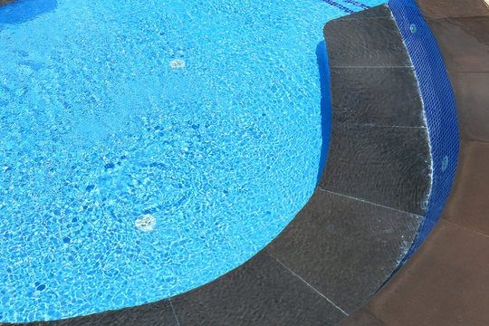 Abstract blue swimming pool