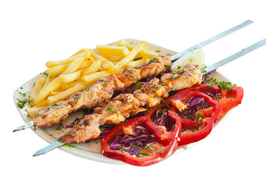 shish kebab on skewers with chips