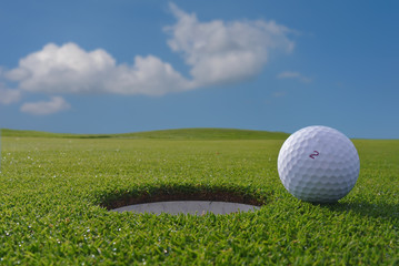golf hole and ball