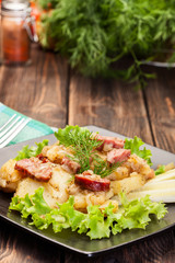 Scalloped potatoes with sausage and bacon