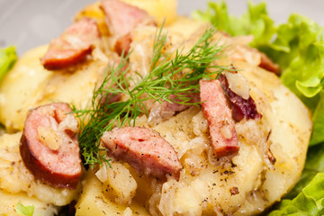 Scalloped potatoes with sausage and bacon