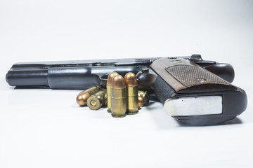 11 mm. Black handgun And ammunition