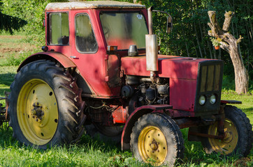 rural red old farm tractor outdoor