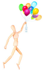wooden Dummy holding flying balloons isolated