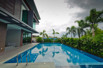 Swimming pool and modern building