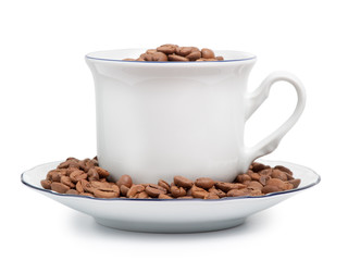 White cup with coffee beans