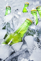Cold beer bottles on ice 1
