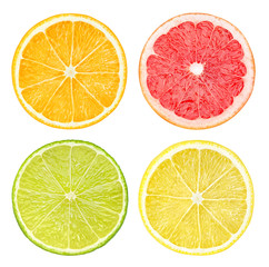 Isolated citrus fruits. Slices of orange, pink grapefruit, lime and lemon fruits isolated on white...