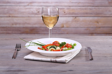 Vegetable salad and wine