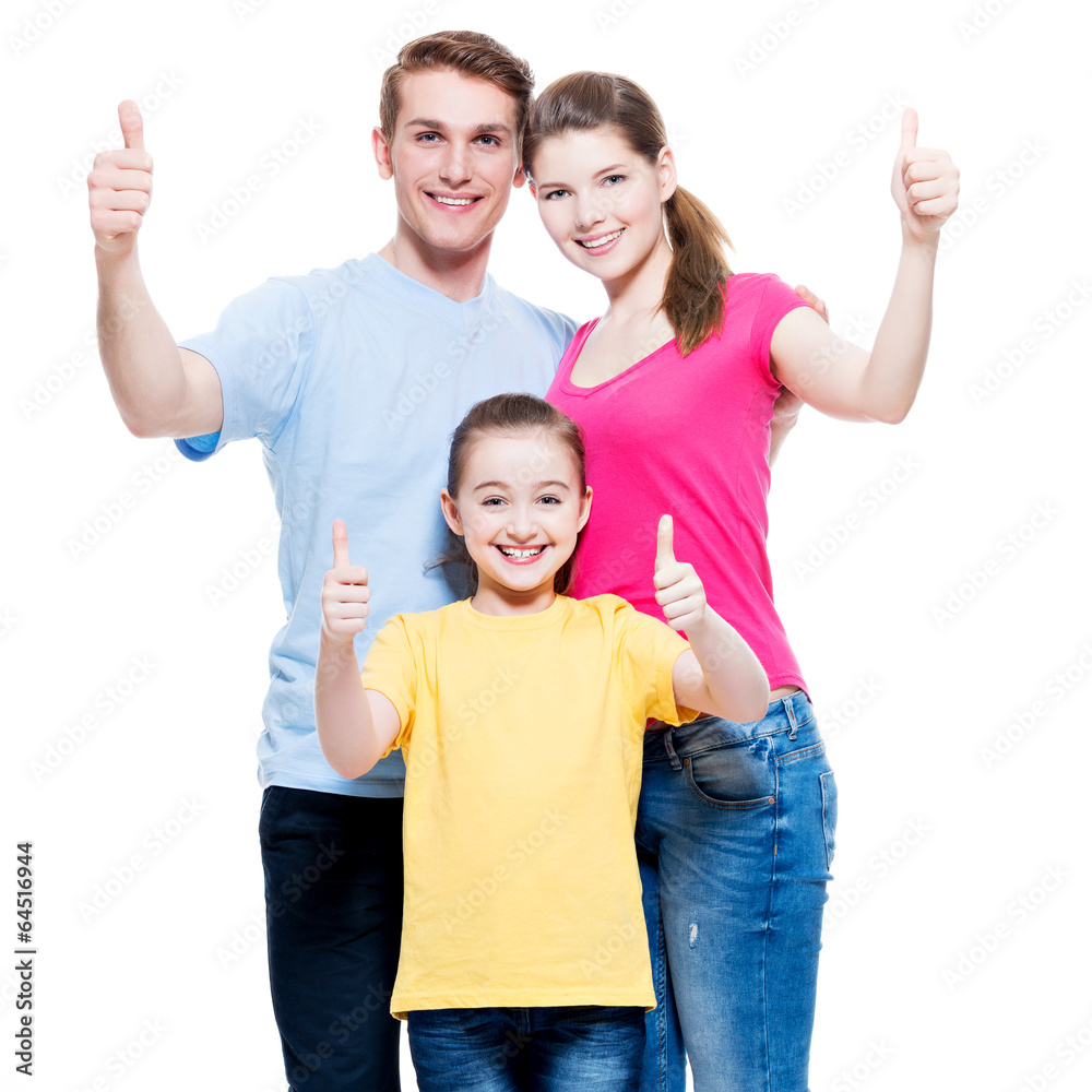 Wall mural Happy family with child shows the thumbs up sign.