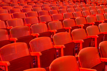 Fototapeta premium Rows of red chairs