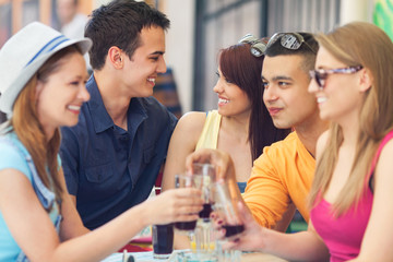 Young friends in a cafe