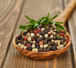Pepper in wooden spoon