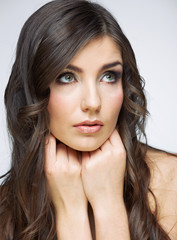 Naklejka premium Woman face close up beauty portrait. Girl with long hair lookin