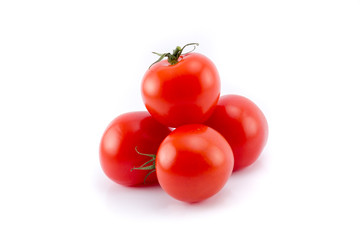 Cherry tomatoes isolated with leaves