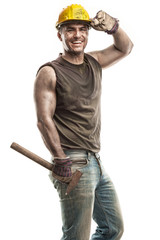 Young dirty Worker Man With Hard Hat helmet  .holding a hammer a