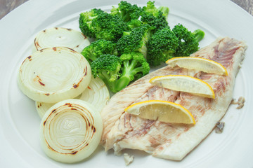 Steamed snapper with broccoli and grilled onions