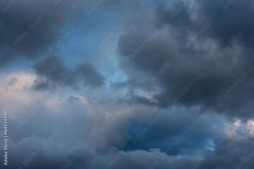Wall mural stormy clouds on spring evening.