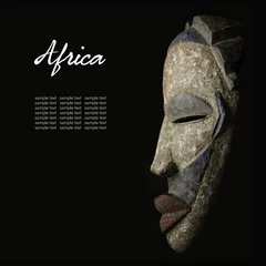 Foto op Plexiglas African mask over black background © agap90