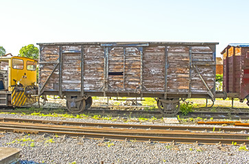 old vintage  train wagon on the rails