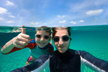 Father and son swimming