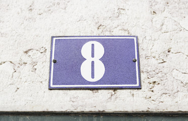 Number eight on a wall